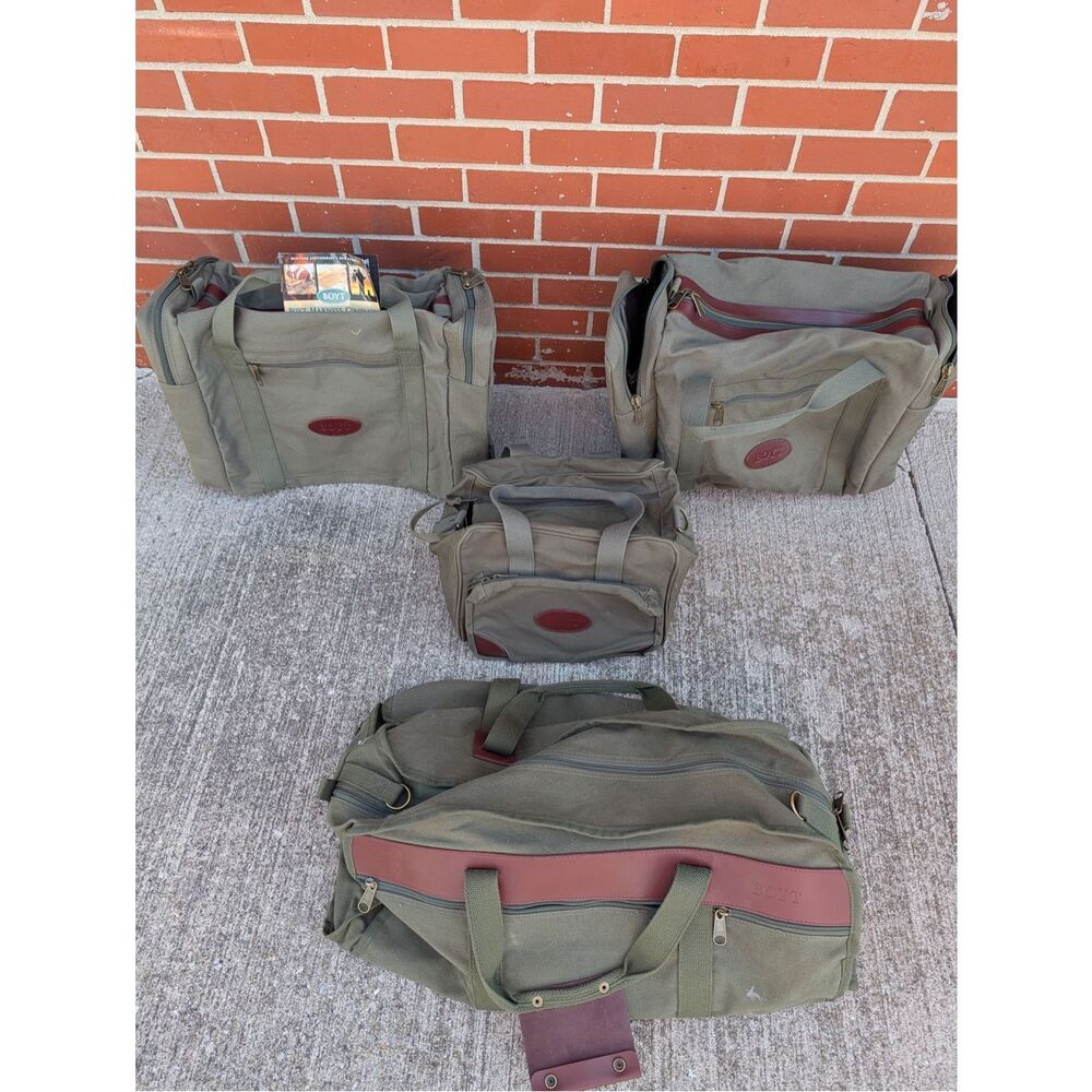 Lot of 4 Boyt Harness Company Signature Series of hunting and sporting clays gea